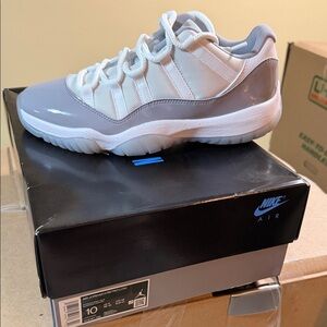 Nike Air Jordan 11 Low White and Gray Sneakers